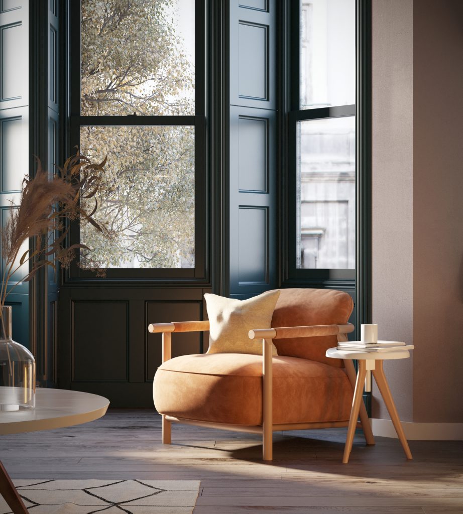Boho nook with cognac armchair by the green bay window with the look on the old town